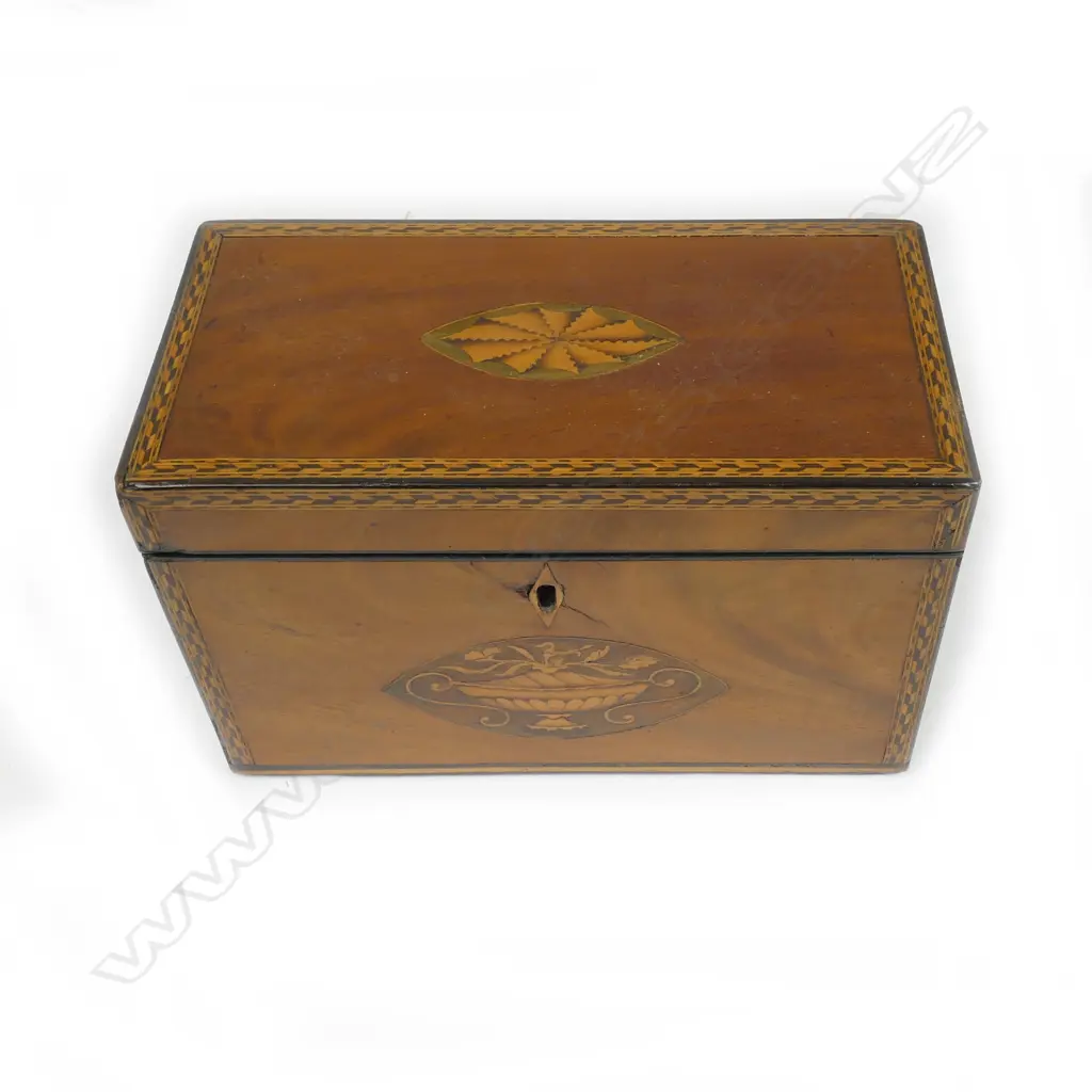A Georgian mahogany inlaid tea caddy Image 1++