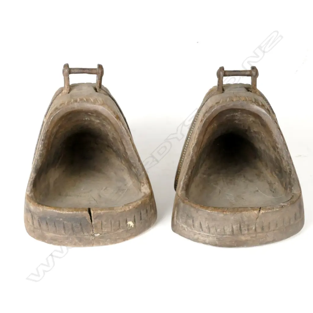 A pair of 19thC Chilean or Peruvian carved wooden stirrups Image 1++