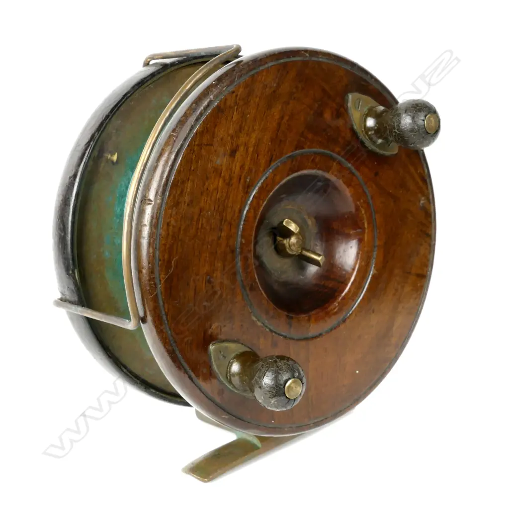 A large English 6½" walnut and brass game fishing reel Image 1++