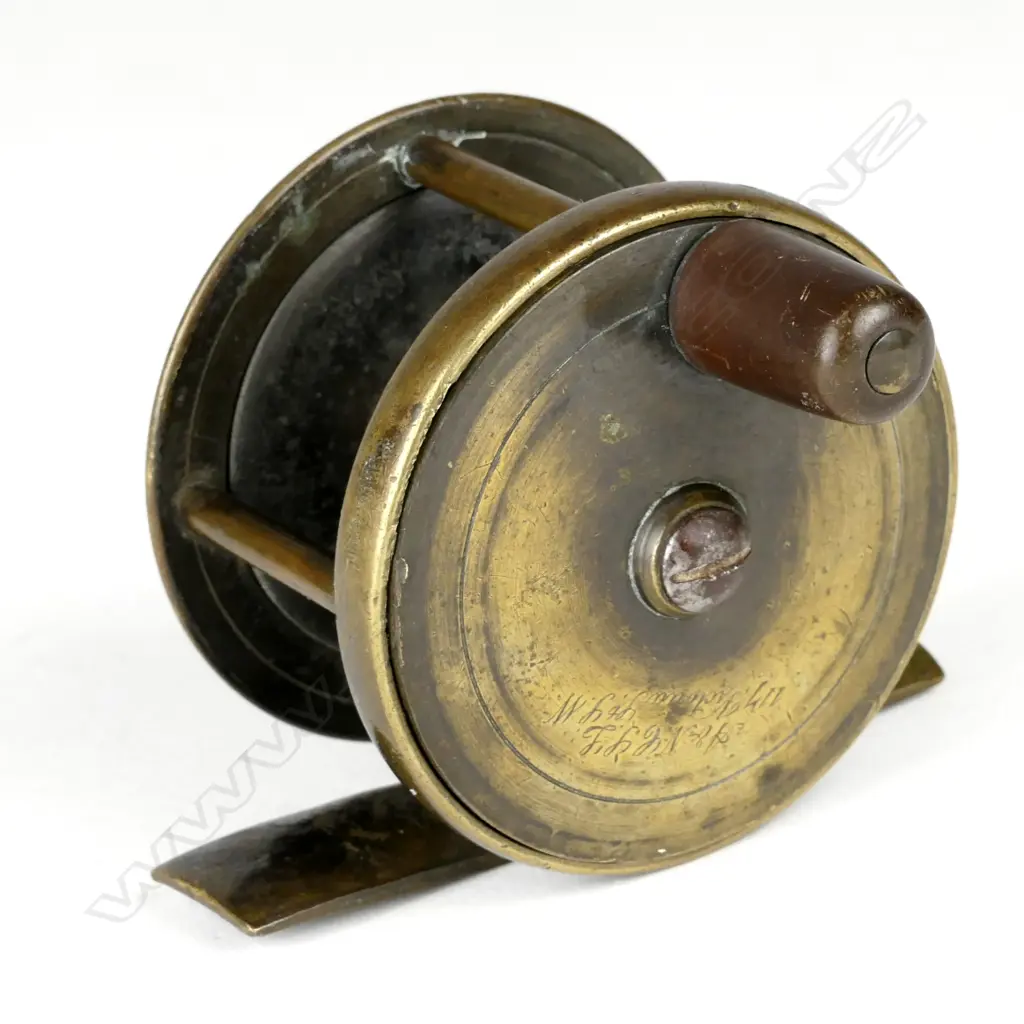 A late 19thC 2½" A.& N.C.L. (Army & Navy) brass plate wind reel Image 1++