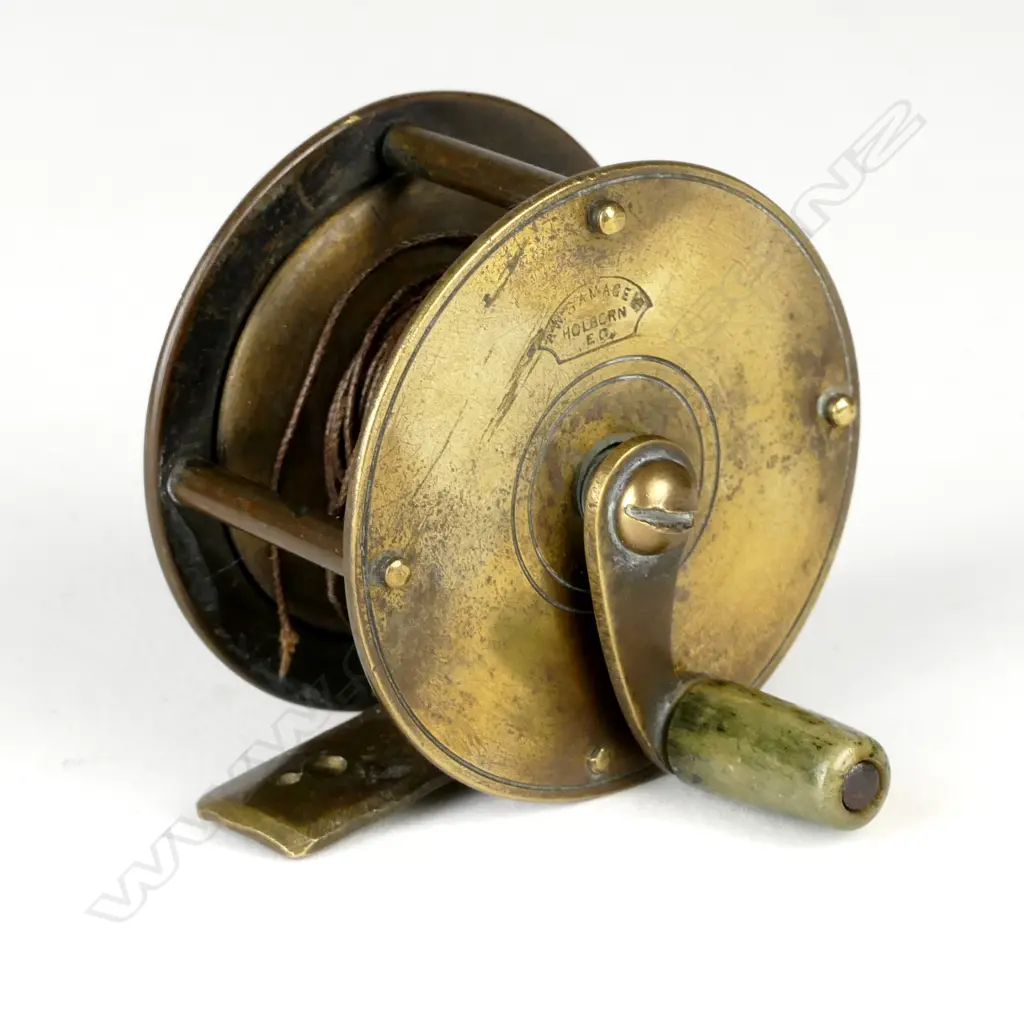 A 19thC brass crank wind 2" reel Image 1++