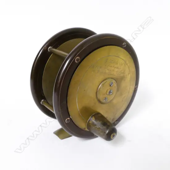 A 4" x 2⅛" ebonite and brass salmon reel