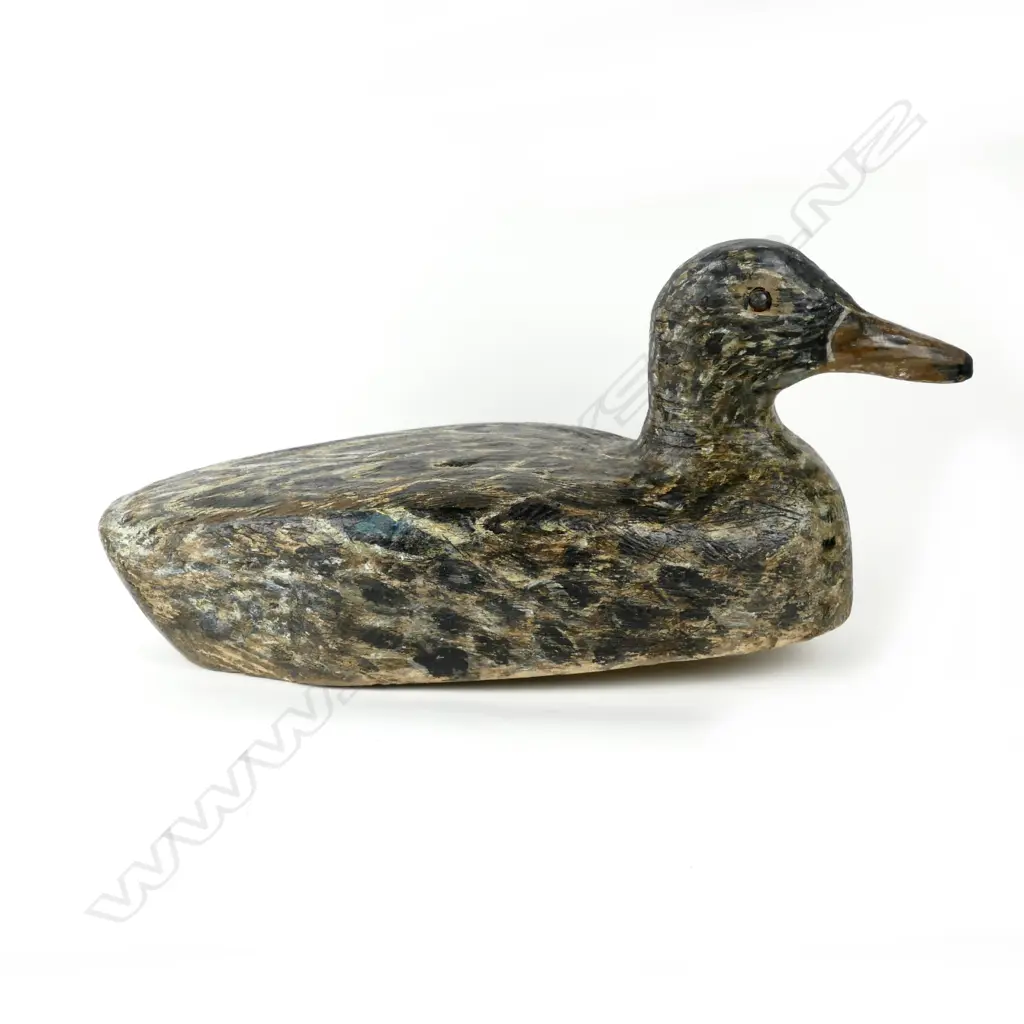 A hand carved balsa hen duck decoy Image 1++