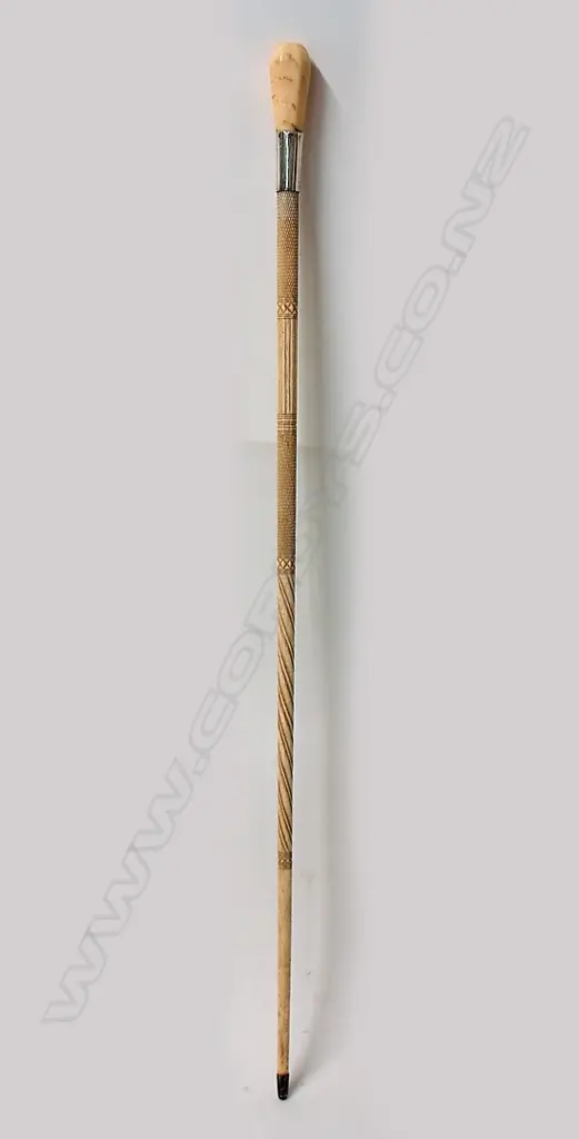 A fine 19thC carved whalebone and marine ivory walking stick Image 1++