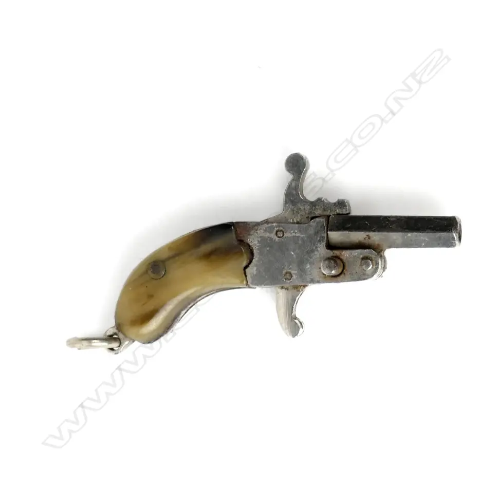 A 2mm single shot miniature pistol Image 1++