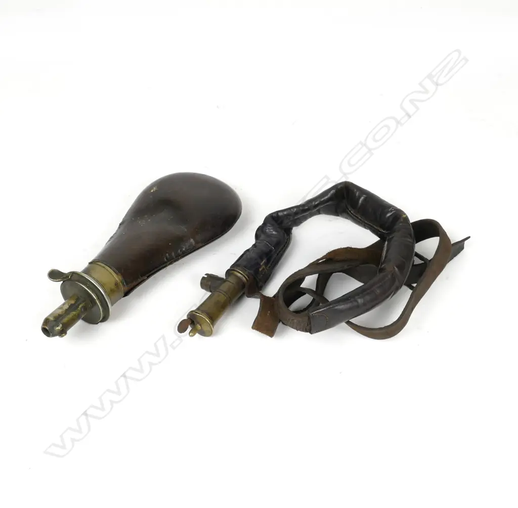 A 19thC leather shot snake and a powder flask Image 1++