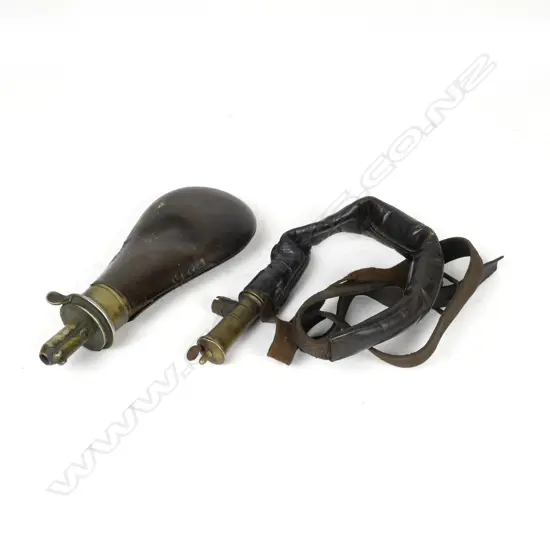 A 19thC leather shot snake and a powder flask