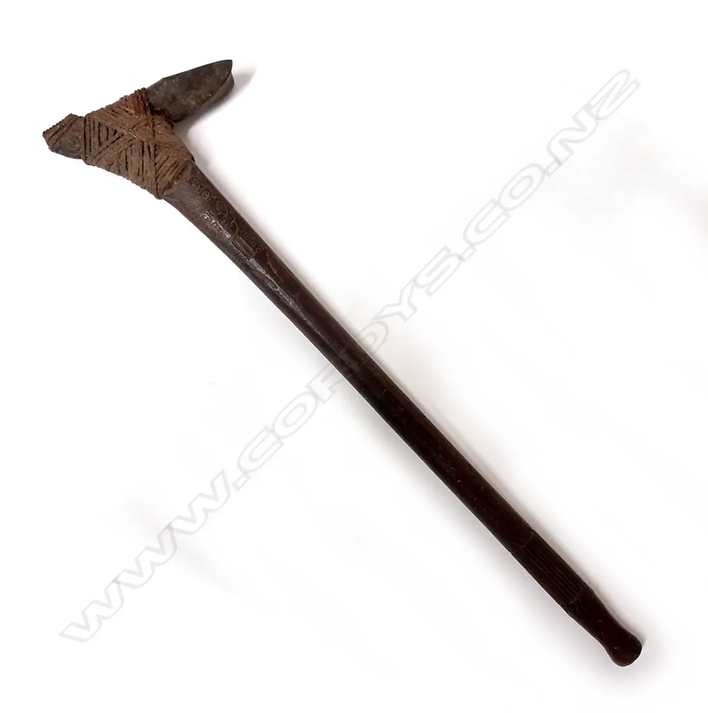 An old Maori/Pacific carved wood and stone hafted adze (toki poutangata) Image 1++