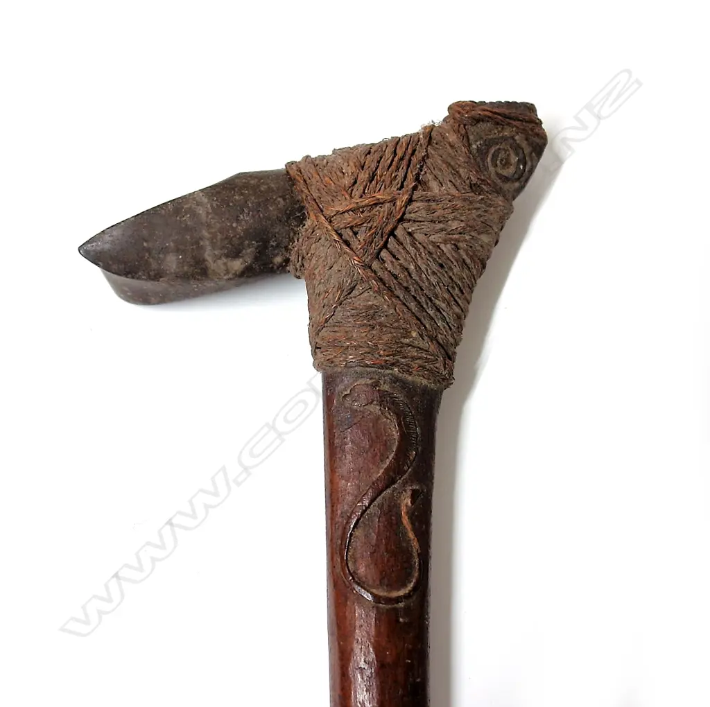 An old Maori/Pacific carved wood and stone hafted adze (toki poutangata) Image 1++