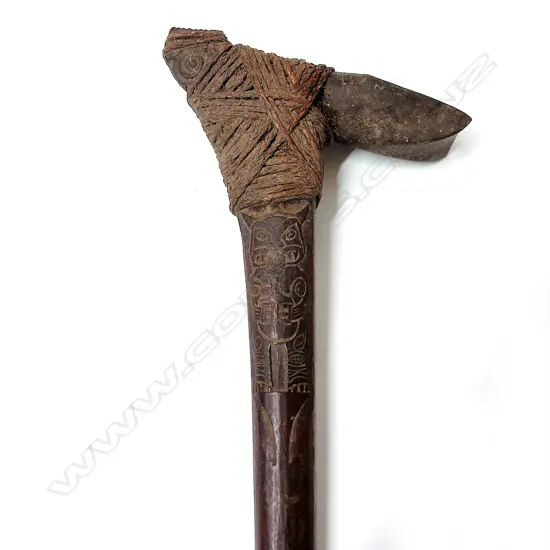 An old Maori/Pacific carved wood and stone hafted adze (toki poutangata)