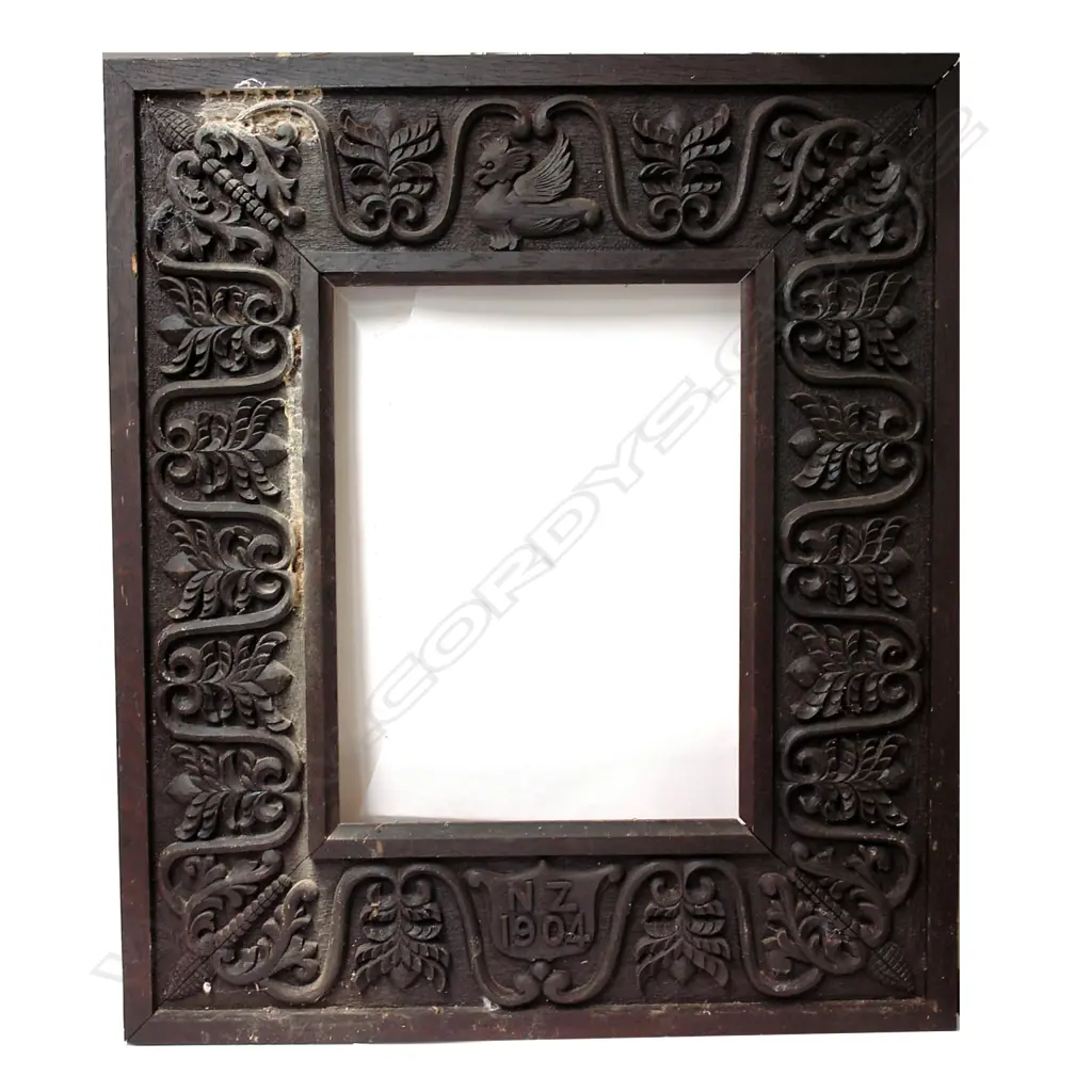 A carved oak 'N.Z. 1904' large picture/mirror frame Image 1++