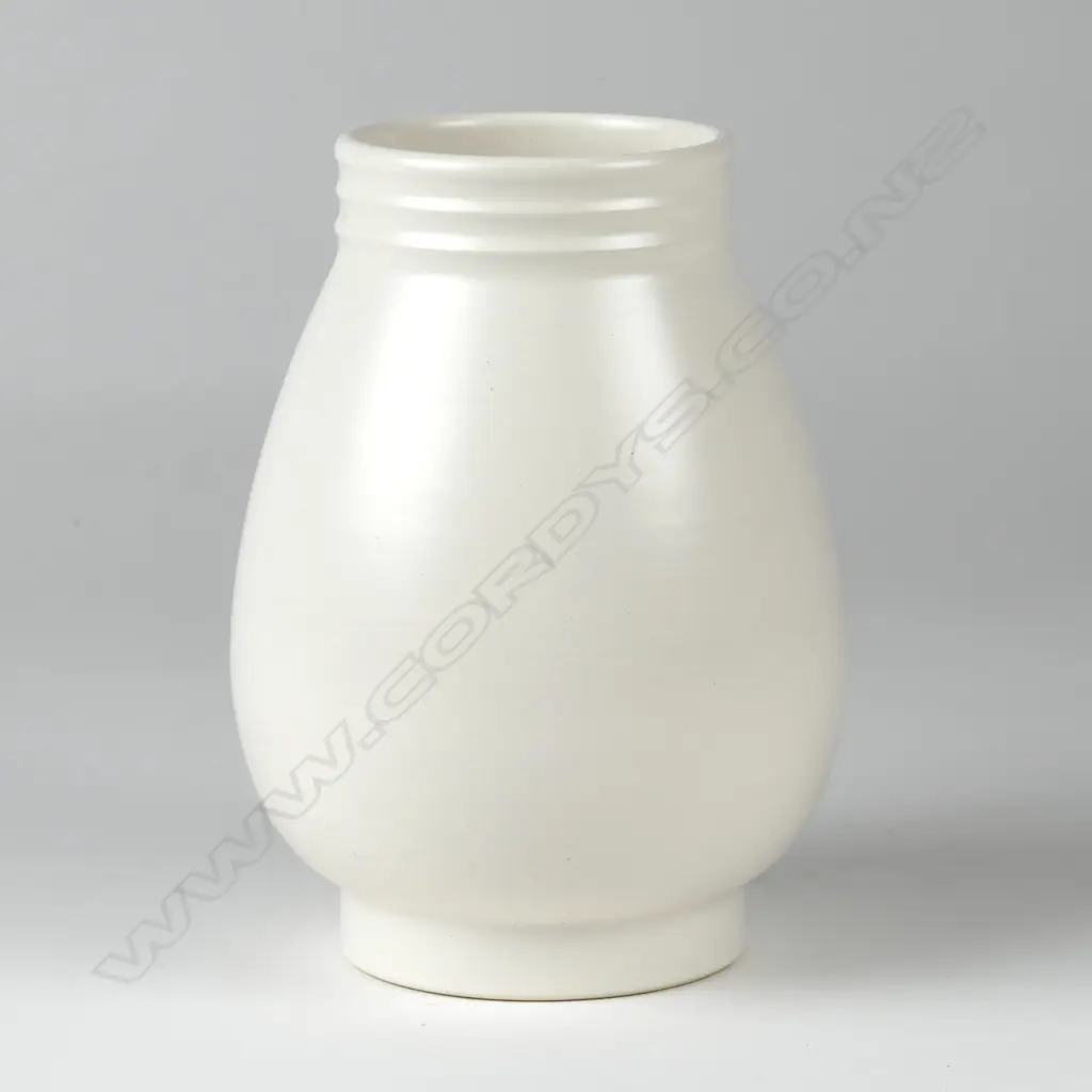 A white Crown Lynn Ernest Shufflebottom baluster vase Image 1++