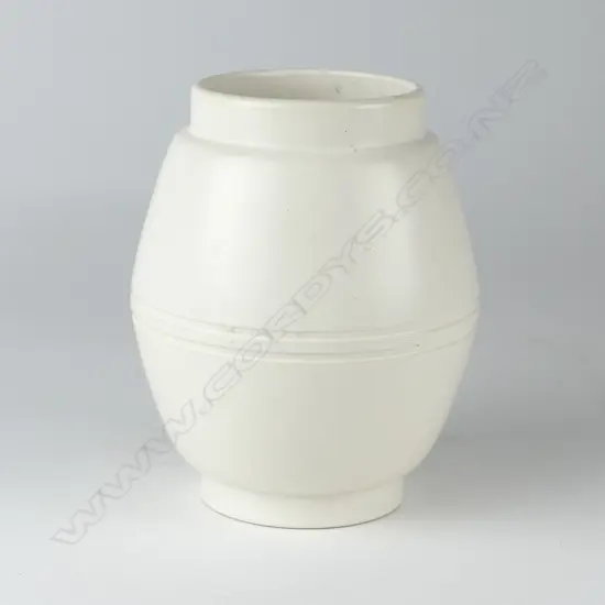 A white Crown Lynn hand potted baluster vase