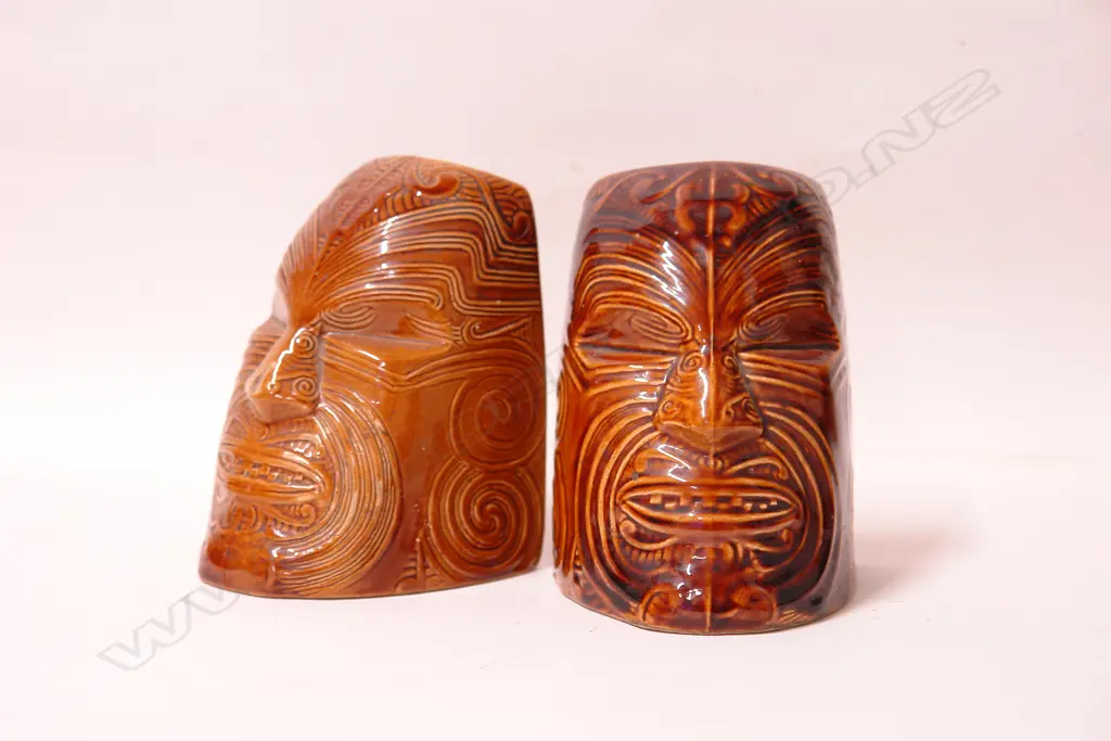 A pair of Crown Lynn Wharetana Maori Art 'Moko' book-ends Image 1++