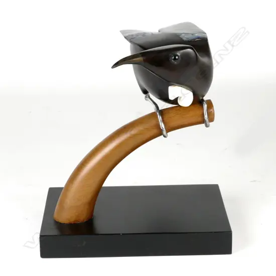 A Martin Carryer carved bird