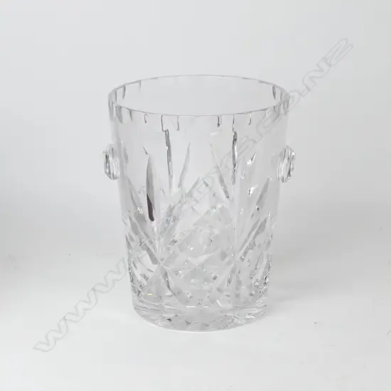 A large cut crystal champagne bucket