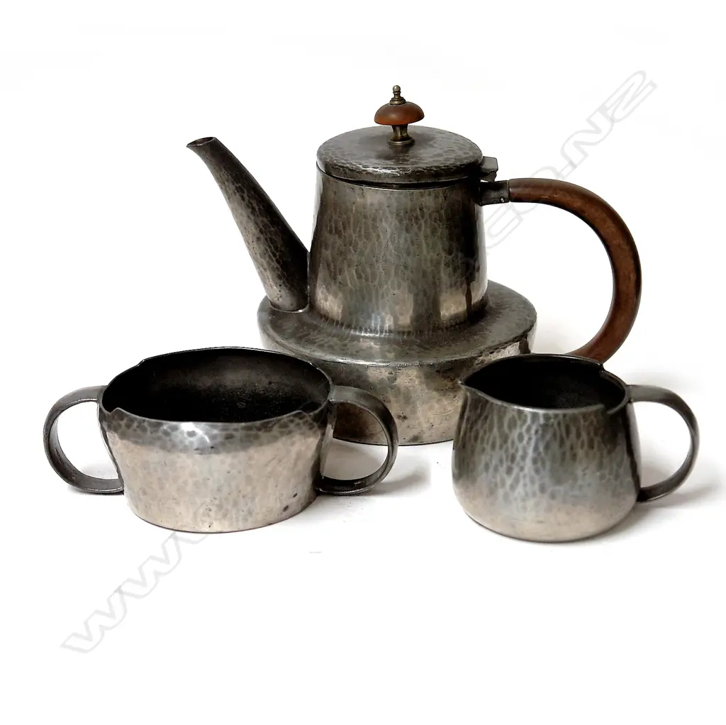 An English Pewter (Tudric) three-piece coffee set Image 1++