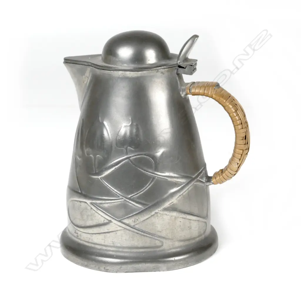 An Archibald Knox Tudric pewter lidded jug Image 1++
