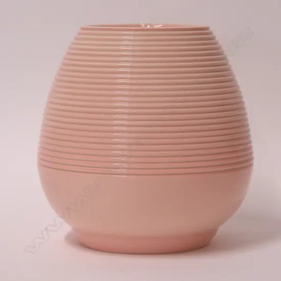 A Carlton Ware hand thrown ribbed vase