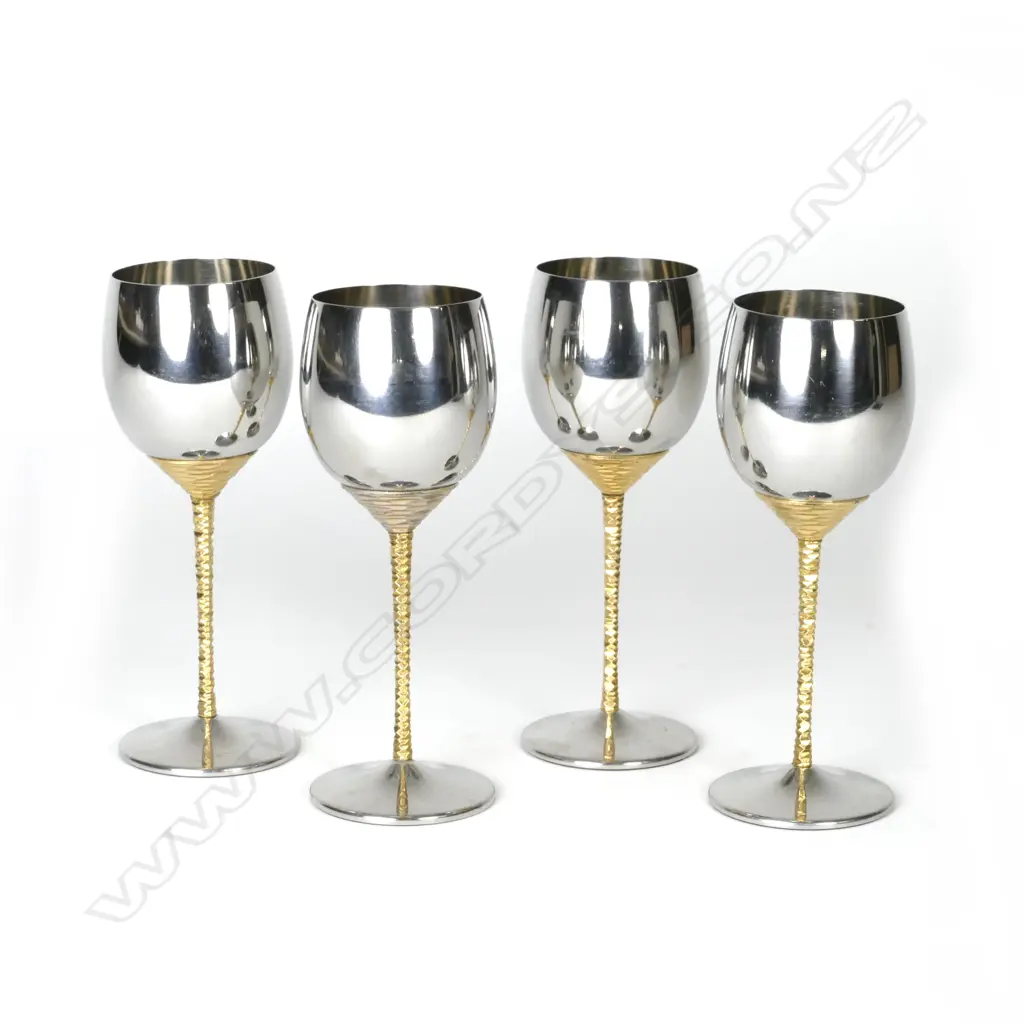 A set of four fine quality Stuart Devlin polished stainless steel goblets Image 1++
