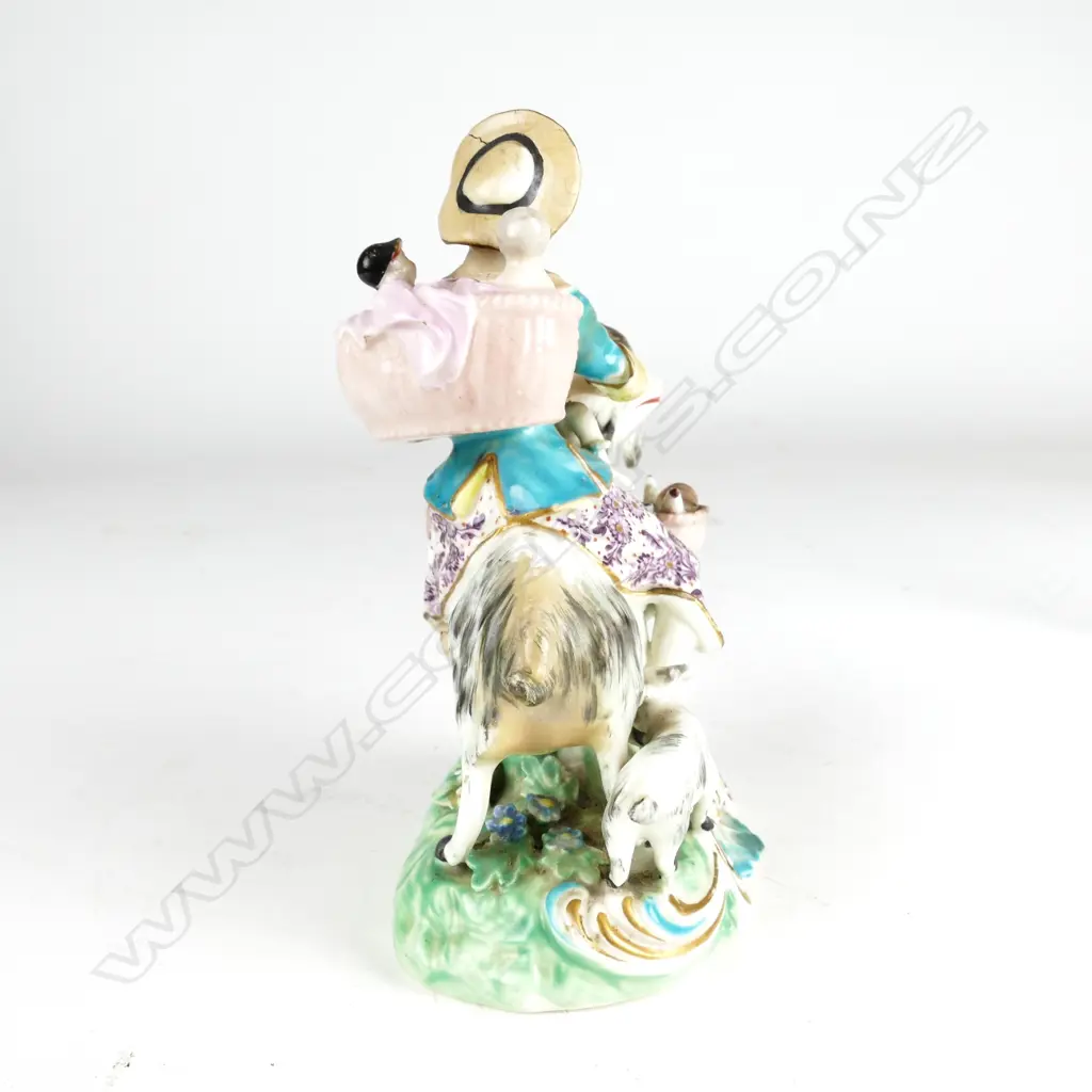 An 18thC Derby figure 'Welsh Tailor's Wife' Image 1++