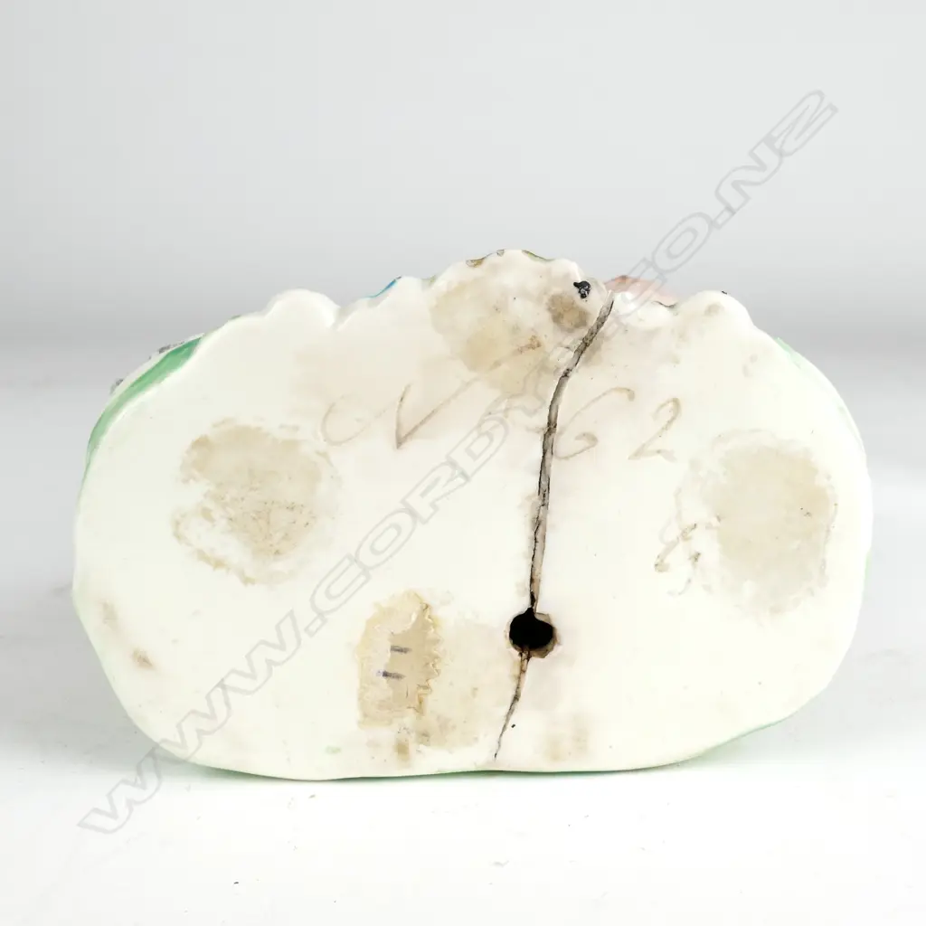 An 18thC Derby figure 'Welsh Tailor's Wife' Image 1++