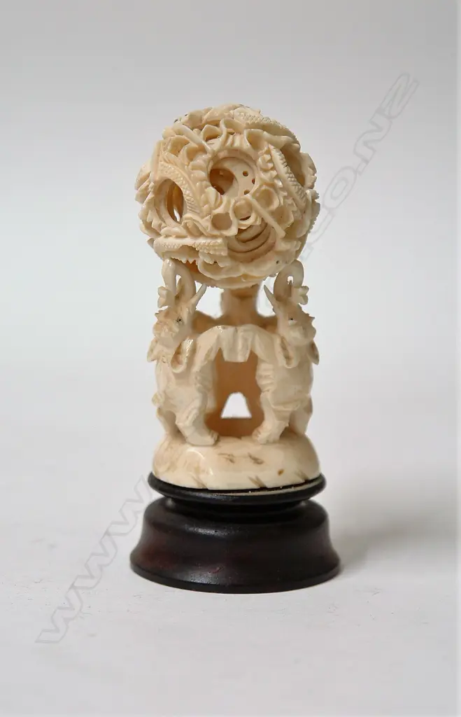 A vintage Chinese carved ivory puzzle ball on stand Image 1++