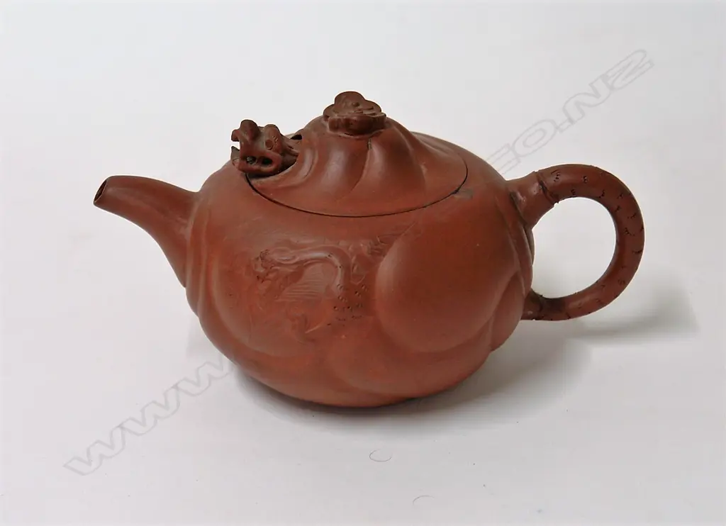 A Chinese Yixing circular teapot Image 1++