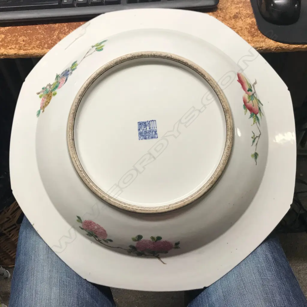 A large Chinese octagonal shaped porcelain bowl with a circular well Image 1++