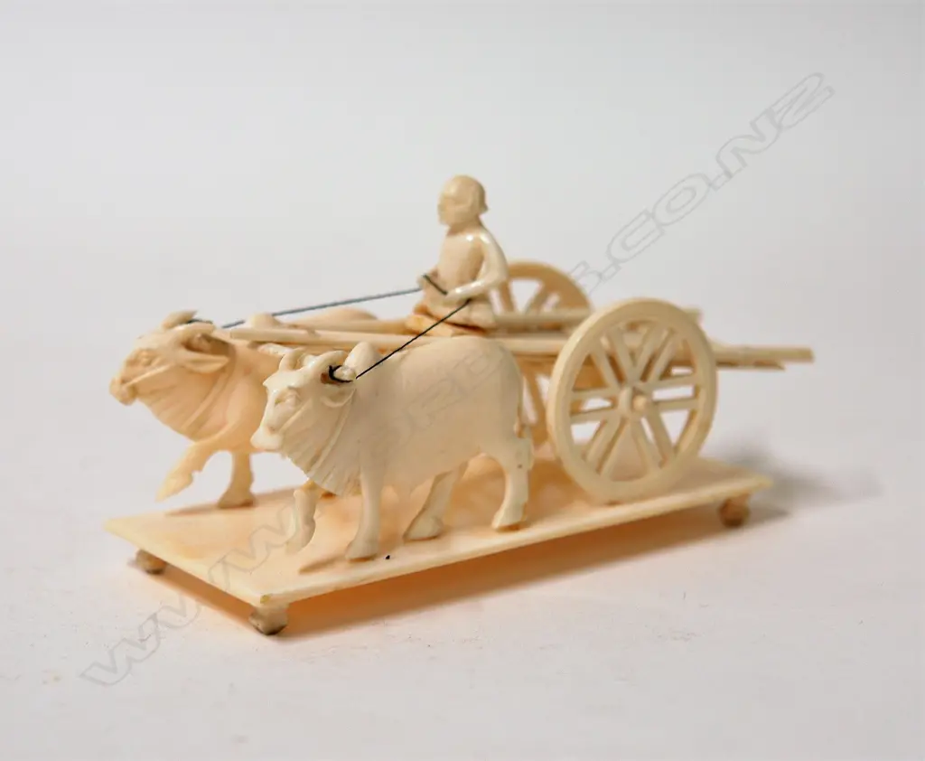 A vintage carved ivory group of a simple double ox-drawn cart Image 1++