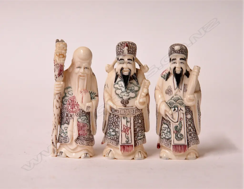 Three small Chinese gods represented as the gods of fortune Image 1++