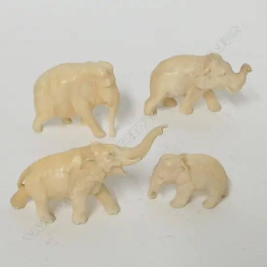 Four small old ivory carved elephants