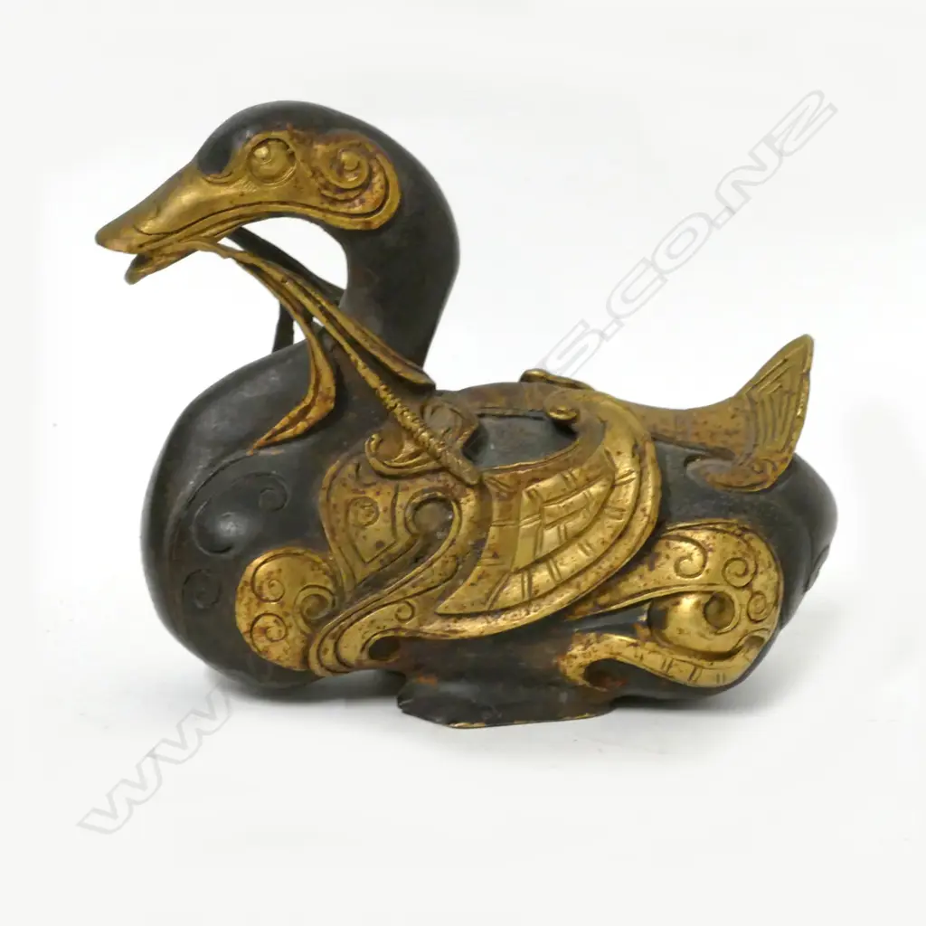 A decorative cast iron duck Image 1++