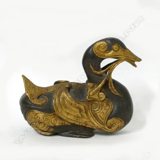 A decorative cast iron duck