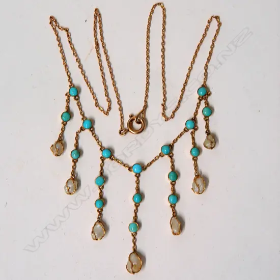 An Edwardian 9ct. yellow gold turquoise and baroque pearl pendant necklace