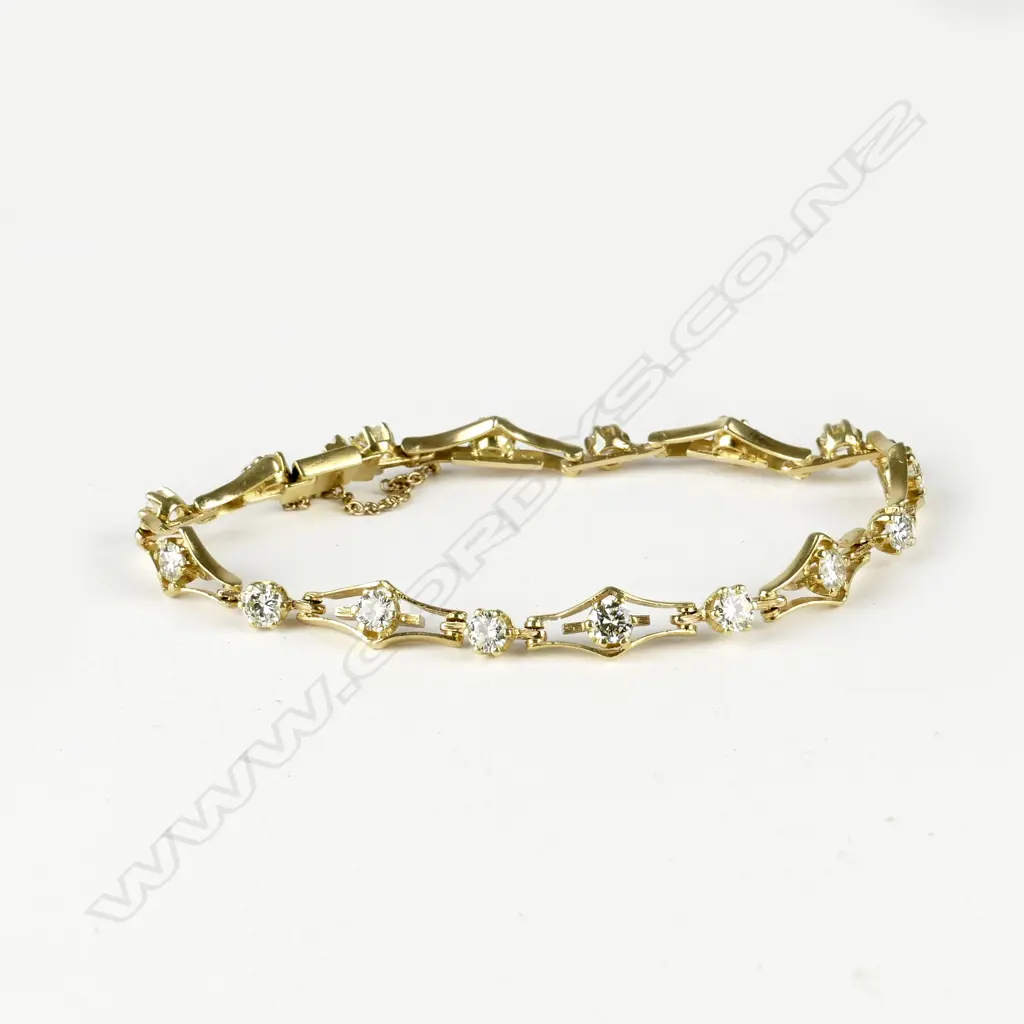 An 18ct. gold and diamond bracelet Image 1++