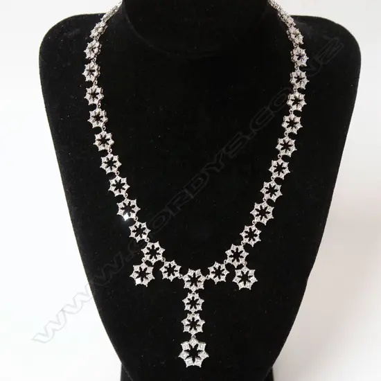 A lady's impressive 18ct. white gold and diamond antique style necklace