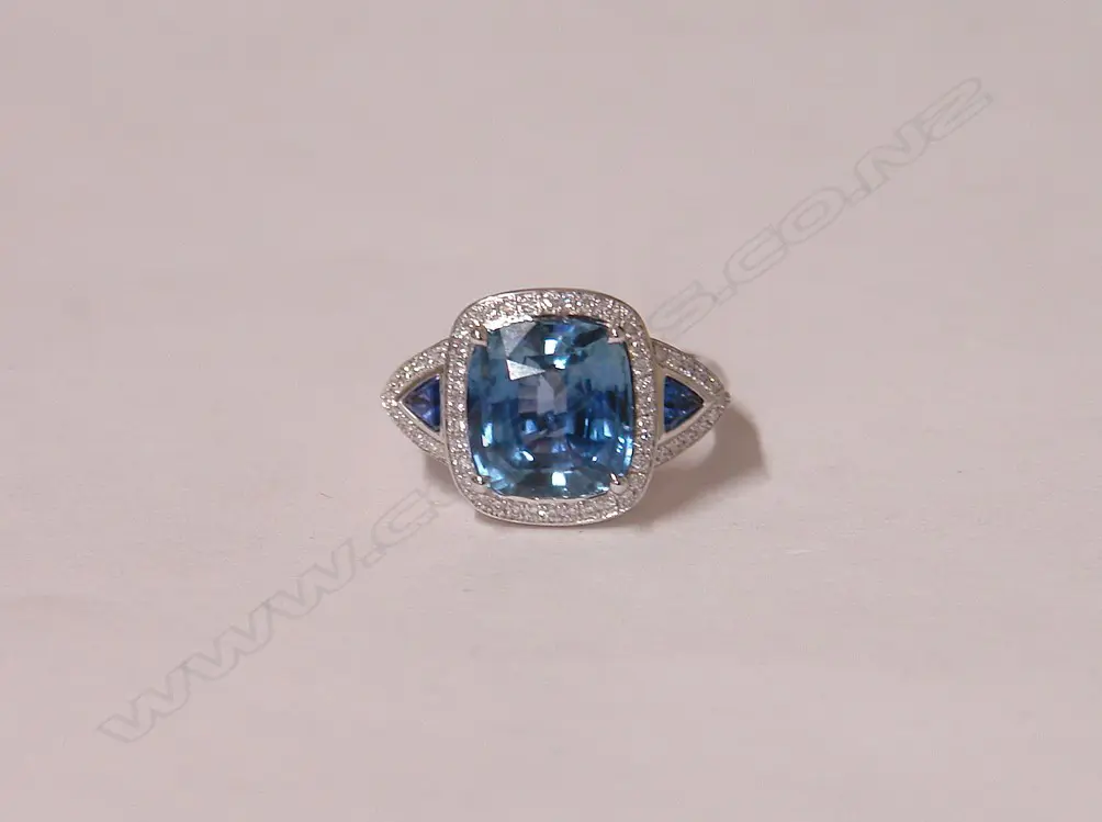 An impressive 18ct white gold sapphire and diamond ring Image 1++