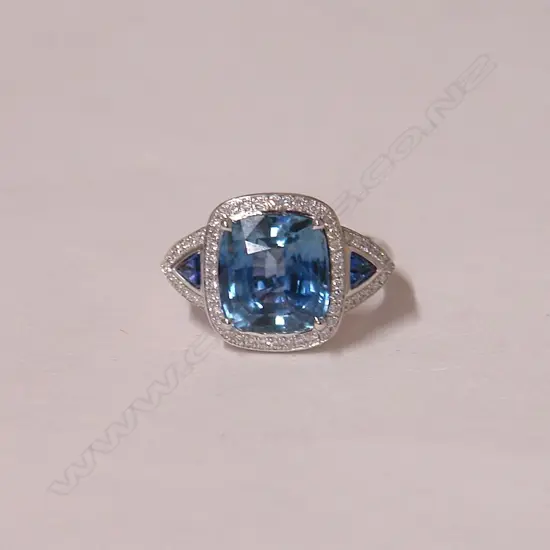 An impressive 18ct white gold sapphire and diamond ring