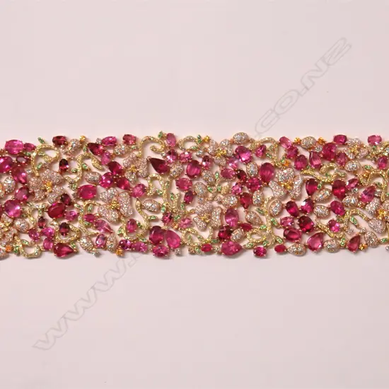 A lady's spectacular 18ct. yellow gold rubellite diamond and precious stone bracelet