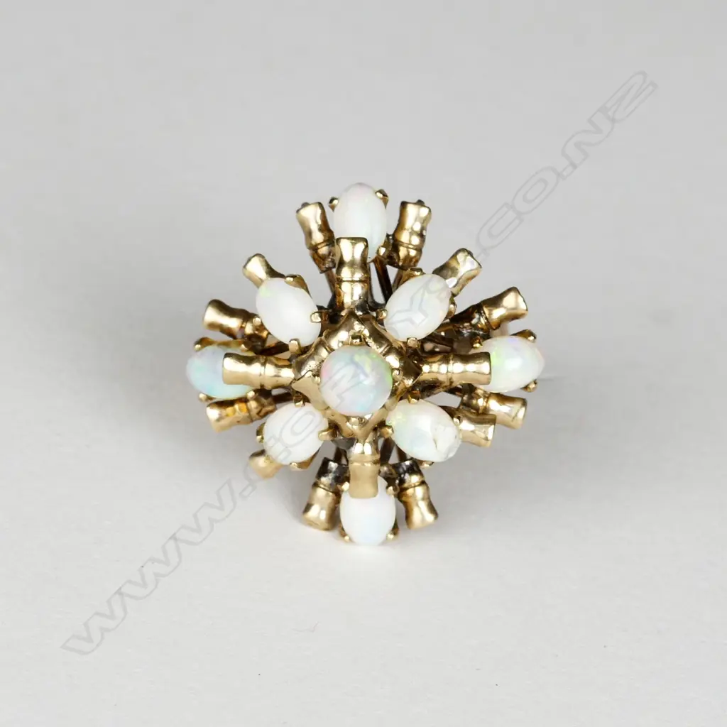 A retro 9ct. gold and opal princess ring Image 1++