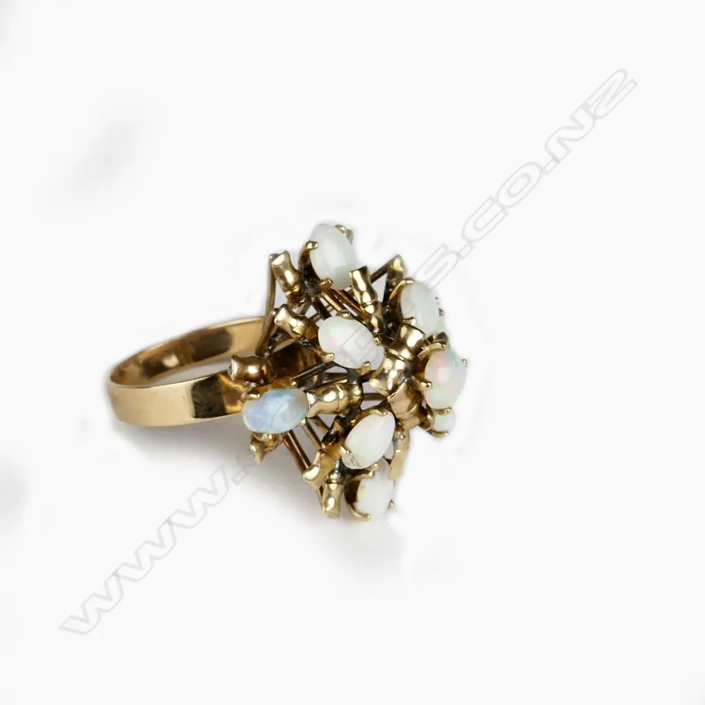 A retro 9ct. gold and opal princess ring Image 1++