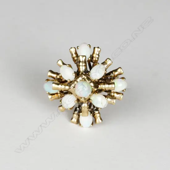 A retro 9ct. gold and opal princess ring