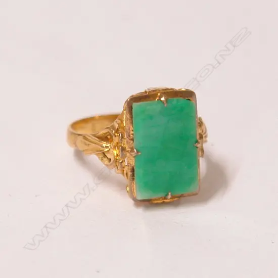 A vintage high carat yellow gold and jadeite dress ring