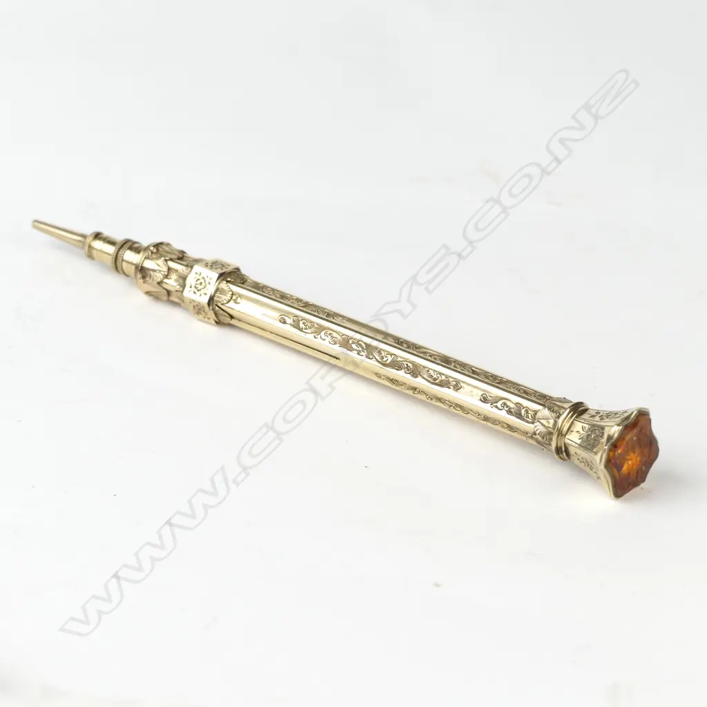 A Victorian 9ct. gold propelling pencil Image 1++