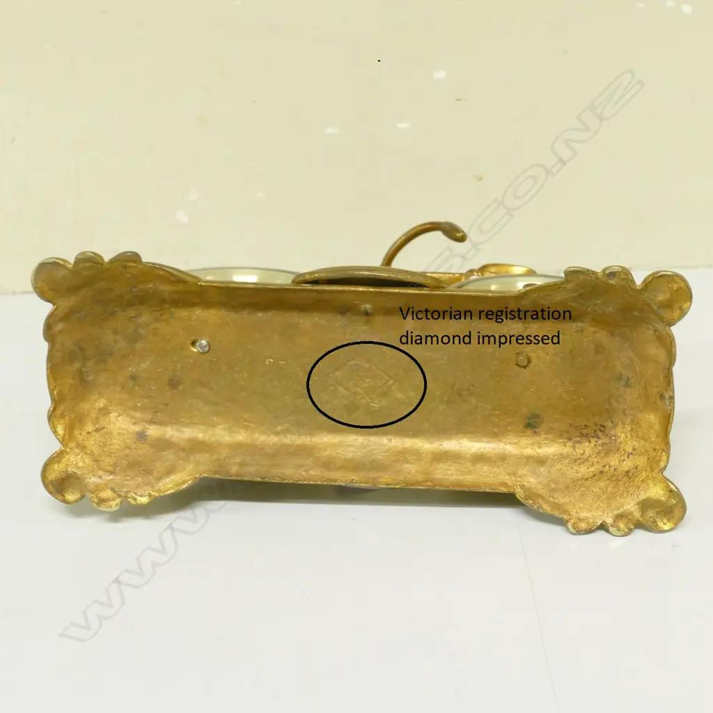 An Edwardian brass desk clock and barometer Image 1++