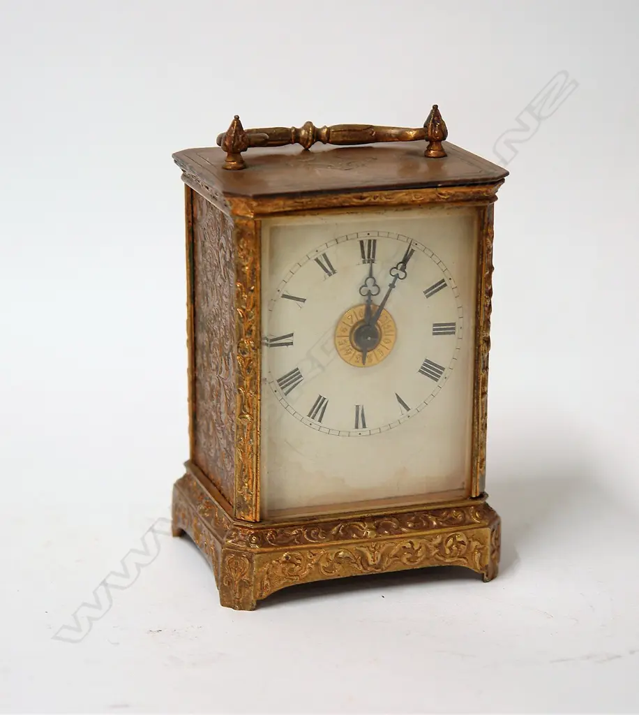 A 19thC decorative French gilt brass cased carriage clock Image 1++