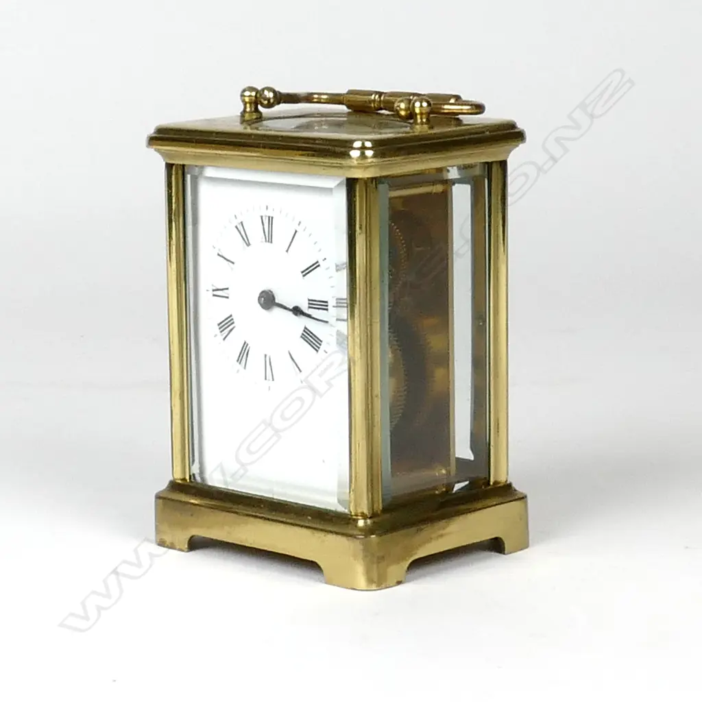 A brass cased carriage clock Image 1++