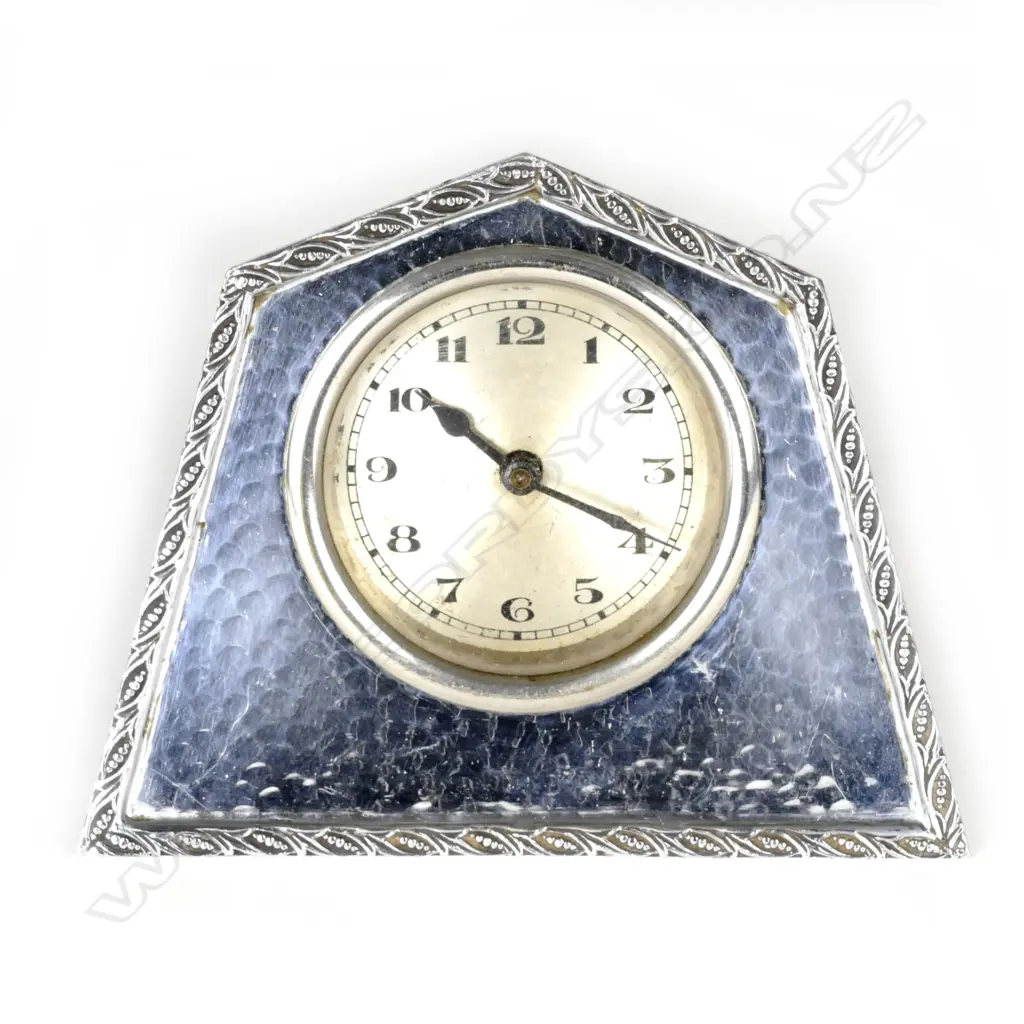 A small Tudric silver plate cased mantel clock Image 1++