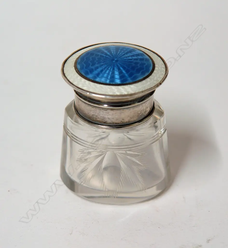 An early 20thC Art Deco enamelled silver and cut glass salt bottle Image 1++